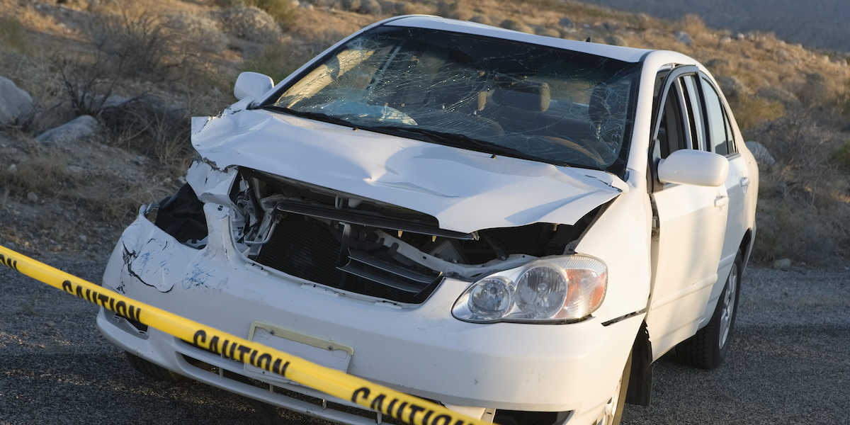 Photo of a Damaged White Car